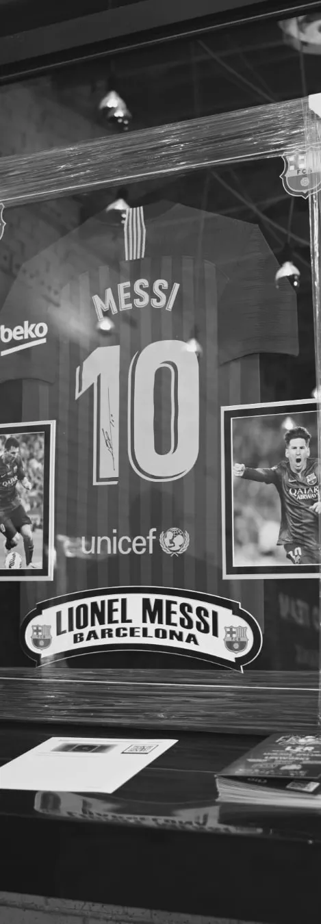 Signed Lionel Messi jersey on the silent auction table